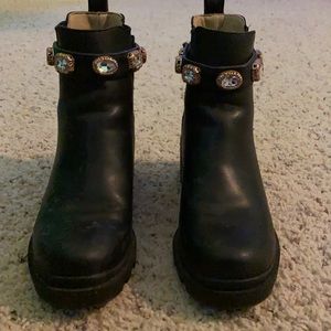 Black Steve Madden booties with removable strap